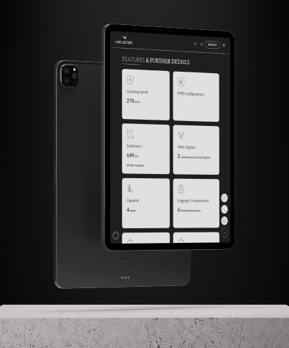 Ein Tablet schwebt hochkant über einer steinigen Fläche. Auf dem Bildschirm des Tablets ist die HELISTAR-Website abgebildet.