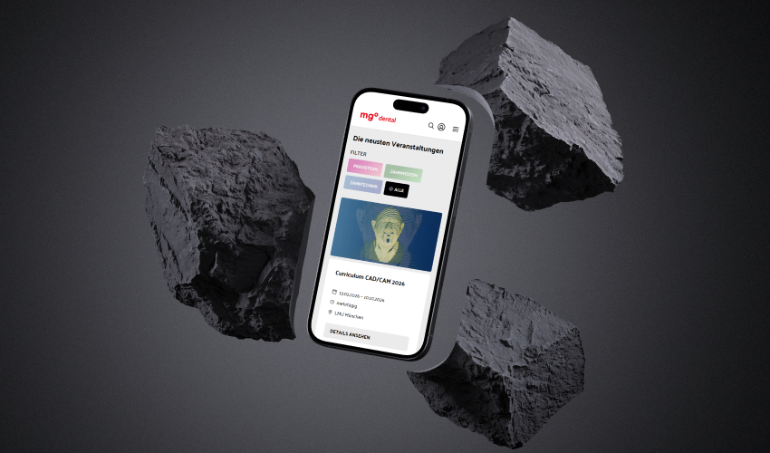 Schwebendes Handy, umgeben von Steinen, zeigt die MGO DENTAL Website 